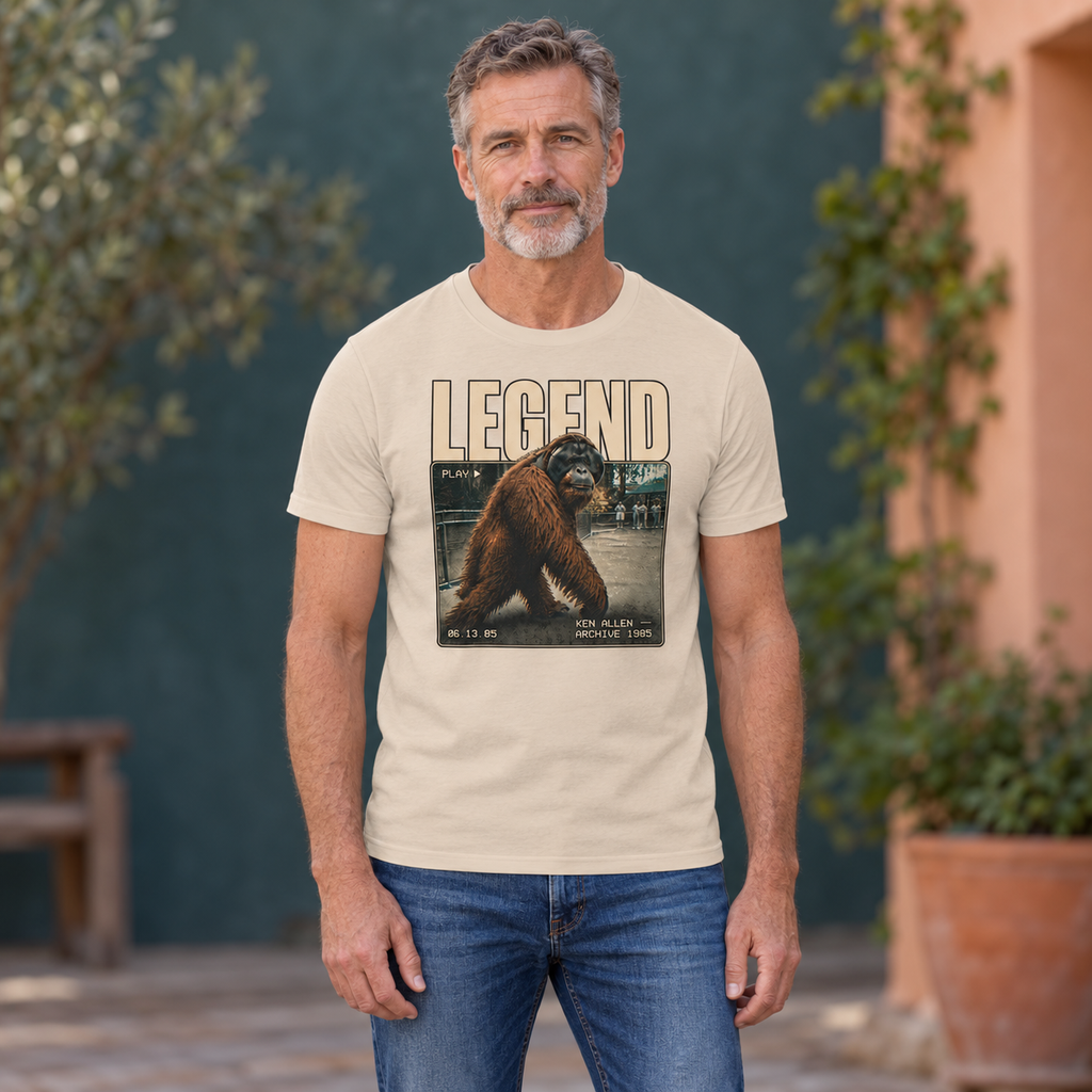 Soft Cream Ken Allen Legend tee with orangutan archive artwork in a teal and terracotta courtyard